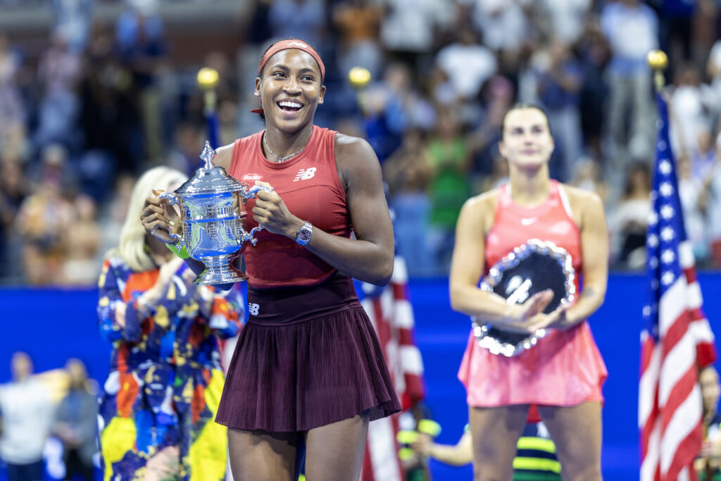Coco Gauff and Aryna Sabalenka at the 2023 US Open women's singles trophy presentation.