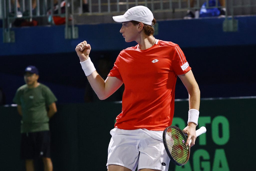 Ignacio Buse of Peru returns the ball to Alejandro Tabilo of Chile during day 2 of the Davis Cup Qualifier match between Chile and Peru at Court Central, Estadio Nacional.