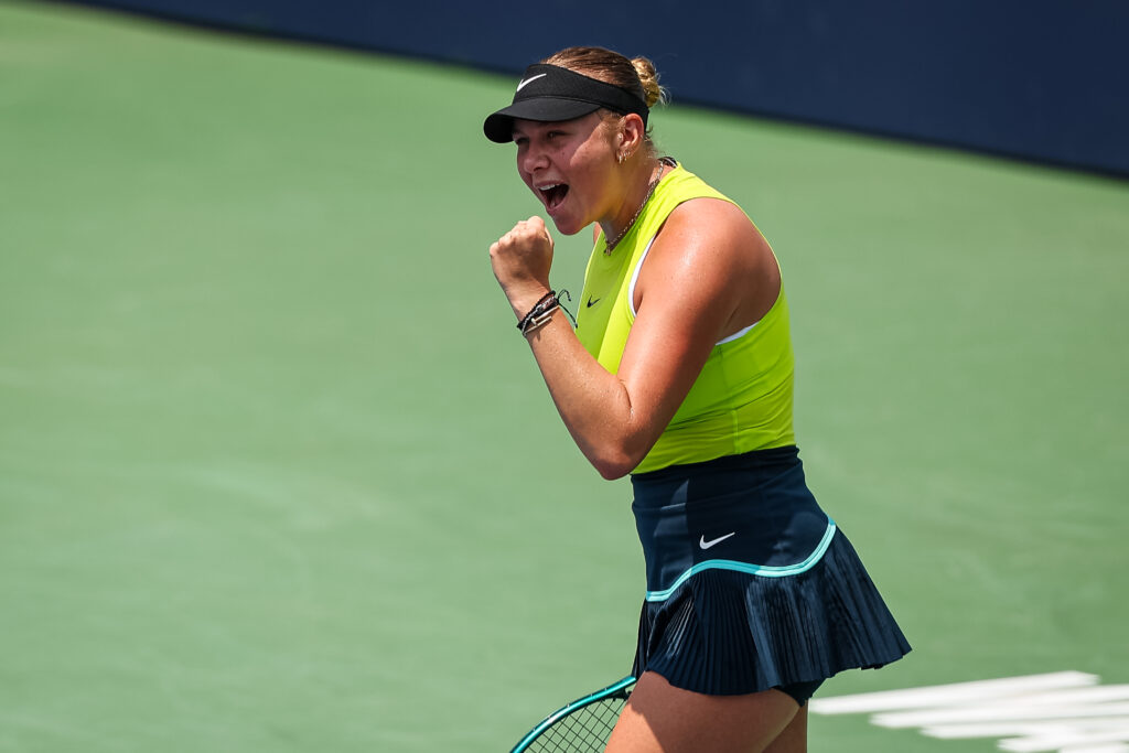 Amanda Anisimova celebrates winning a points at the 2024 Washington Open