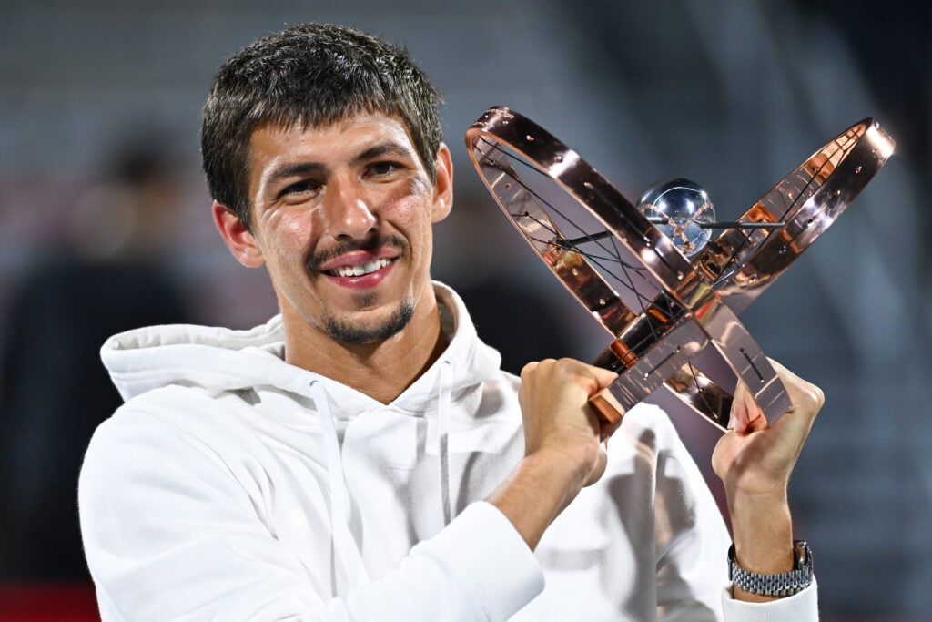 Alexei Popyrin of Australia celebrates with his trophy after defeating Andrey Rublev in two sets 6-2, 6-4 during the Men's Singles Final match on day seven of the ATP Masters 1000 National Bank Open at Stade IGA on August 12, 2024 in Montreal, Canada.
