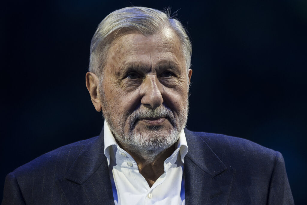 Ilie Nastase, fromer tennis player, looks on prior to the round robin singles match between Jannik Sinner of Italy and Daniil Medvedev during day five of the Nitto ATP Finals.