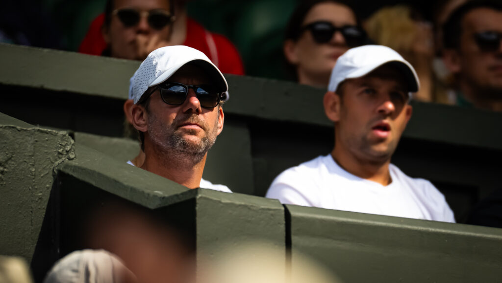 Coach Wim Fissette watches Iga Swiatek of Poland during the second round on Day Four of The Championships Wimbledon 2025 at All England Lawn Tennis and Croquet Club.