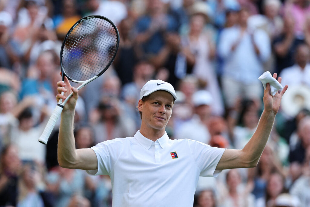 Jannik Sinner celebrates a win over Aleksander Vukic at Wimbledon in 2025.