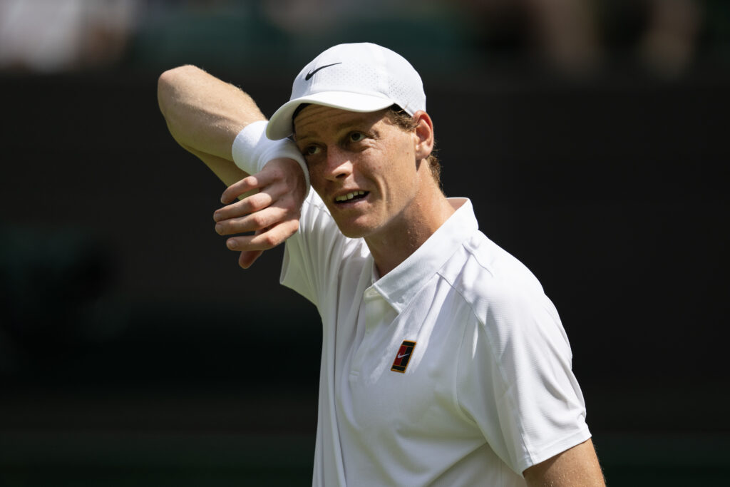 Jannik Sinner during his first-round match at Wimbledon in 2025.
