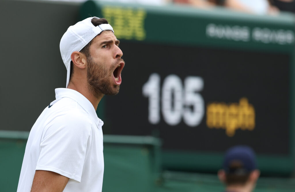 Karen Khachanov celebrates at Wimbledon in 2025.