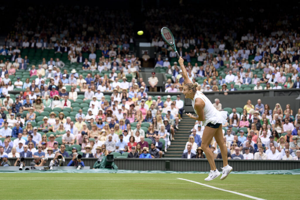 Aryna Sabalenka serves the ball against Marie Bouzkova of Czechia during the Ladies' Singles second round match on day three of The Championships Wimbledon 2025 at All England Lawn Tennis and Croquet Club.