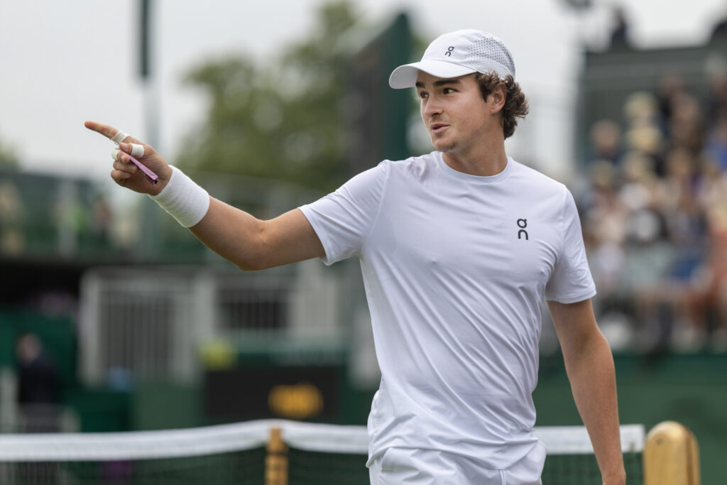 Joao Fonseca of Brazil during his match against Jenson Brooksby of the United States in the second round of the Gentlemen's Singles Competition on Court No. 12 during the Wimbledon Lawn Tennis Championships at the All England Lawn Tennis and Croquet Club.