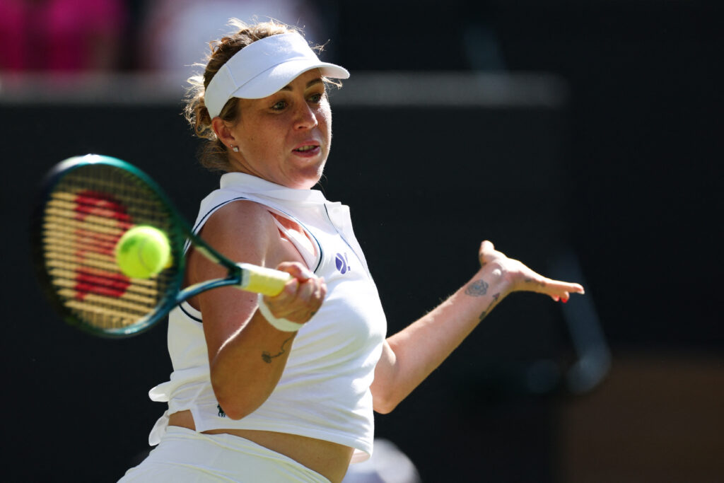 Anastasia Pavlyuchenkova hits a forehand against Amanda Anisimova at Wimbledon in 2025