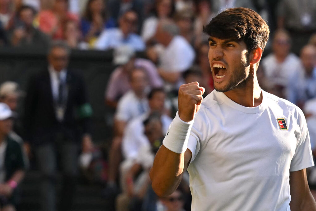 Carlos Alcaraz celebrates his win over Cameron Norrie at Wimbledon in 2025
