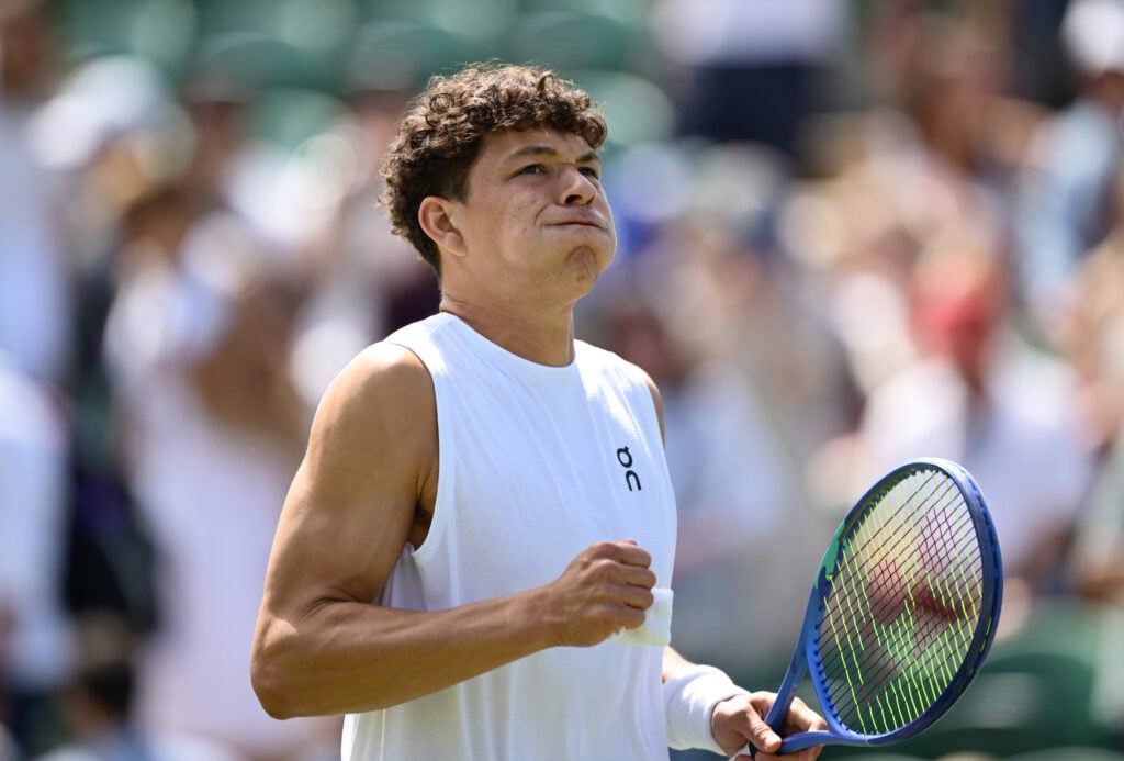 Ben Shelton reacts during his match with Rinky Hijikata at Wimbledon in 2025.