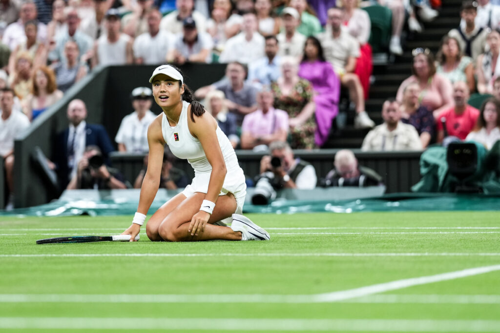 Emma Raducanu in action at the Wimbledon Championships against Aryna Sabalenka
