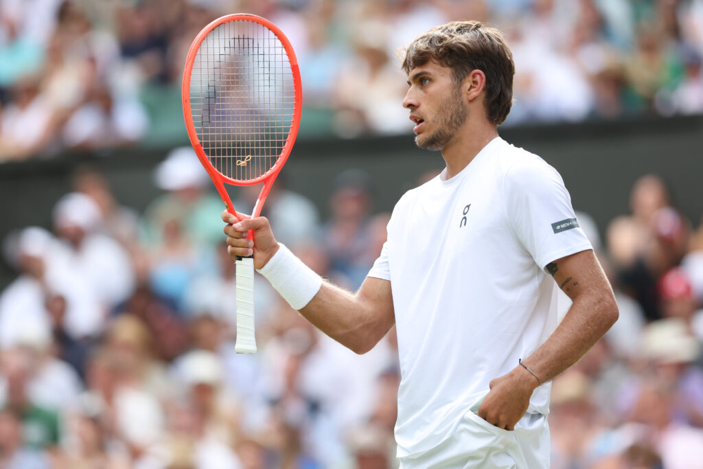 Flavio Cobolli during his Gentlemen's Singles Quarter-Final match against Novak Djokovic during day ten of The Championships Wimbledon 2025 at All England Lawn Tennis and Croquet Club.