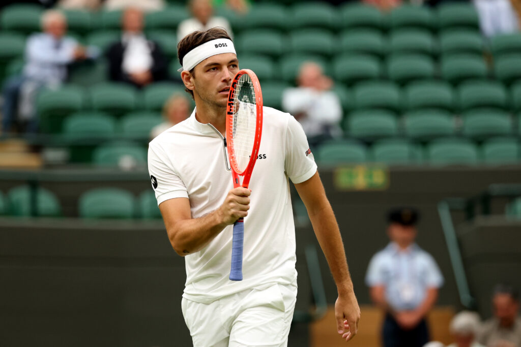 Taylor Fritz wins a set in his Wimbledon quarter-final.