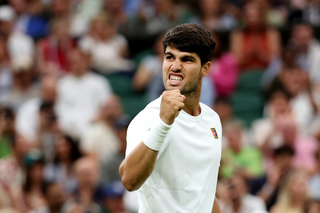 Carlos Alcaraz celebrates during his win over Andrey Rublev at Wimbledon in 2025