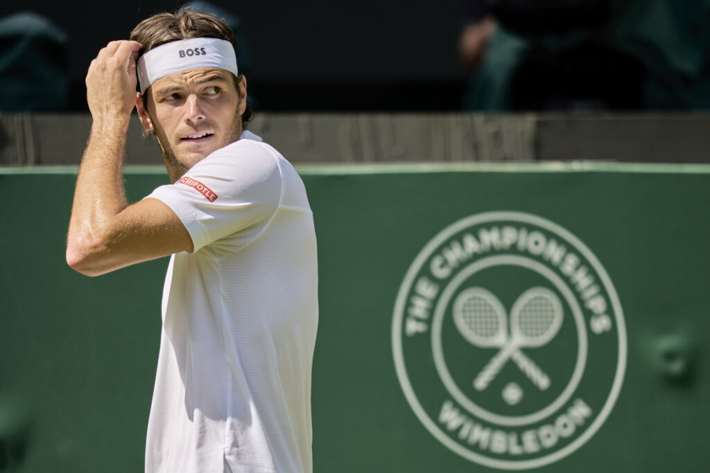 Taylor Fritz of the United States looks down the court against Karen Kachanov during the Gentlemen's quarter-finals round match on Number One Court on day nine of The Championships Wimbledon 2025 at All England Lawn Tennis and Croquet Club.