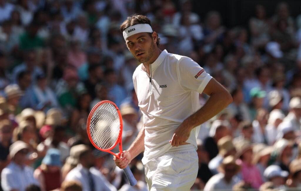 Taylor Fritz reacts during his Wimbledon semifinal against Carlos Alcaraz.