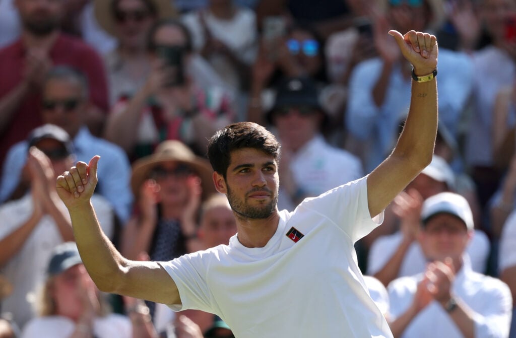 Carlos Alcaraz acknowledges the crowd after the 2025 Wimbledon semifinal