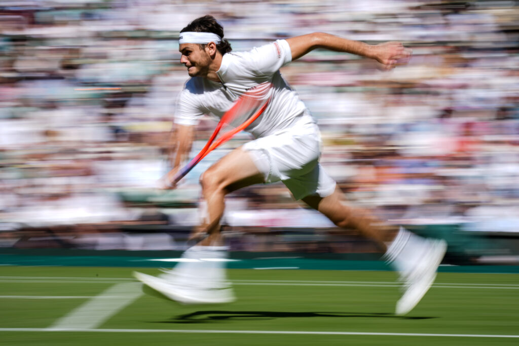 Taylor Fritz gathers speed as he rushes for a shot