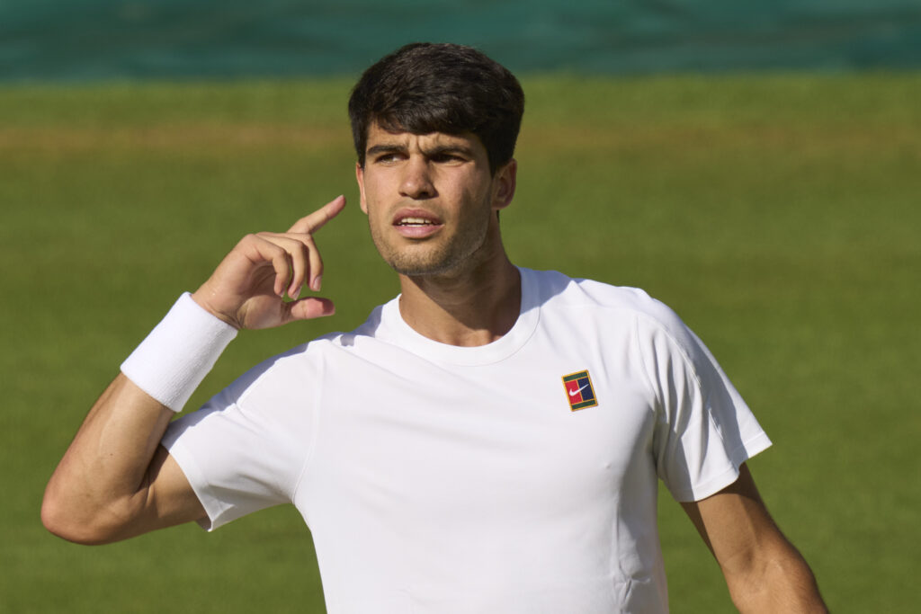 Carlos Alcaraz of Spain reacts as he takes the first set against Jannik Sinner of Italy during Gentlemen's singles final on Centre Court on day fourteen of The Championships Wimbledon 2025 at All England Lawn Tennis and Croquet Club.