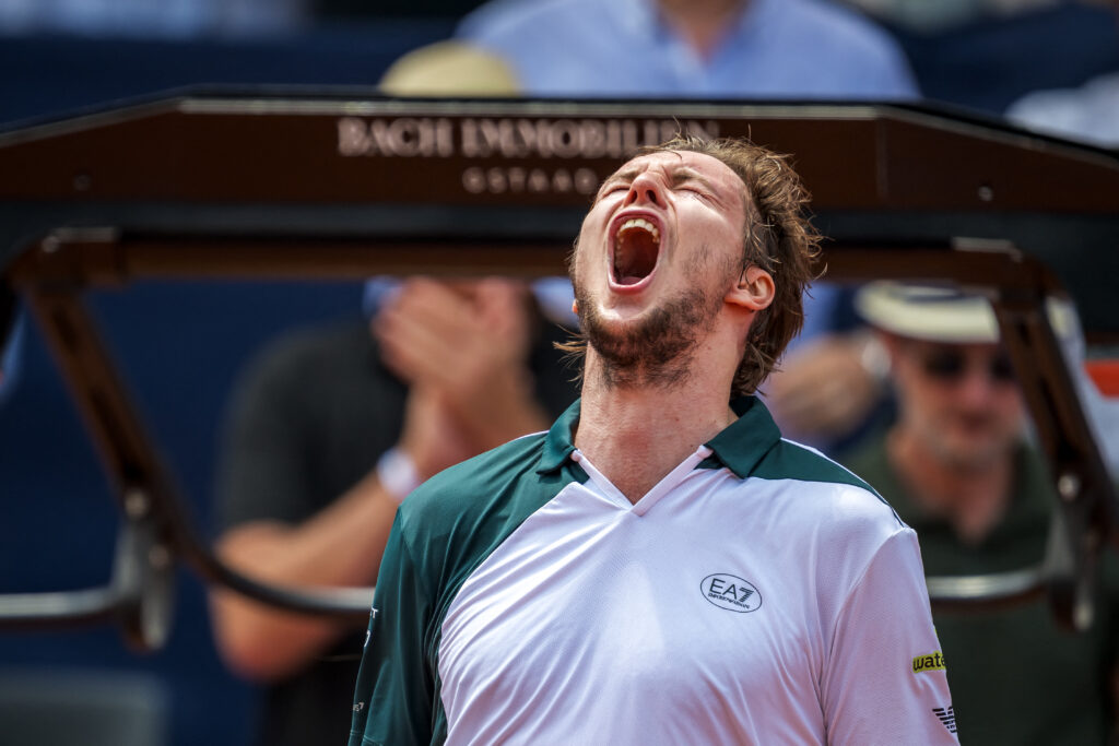 Alexander Bublik celebrates winning the Swiss Open.
