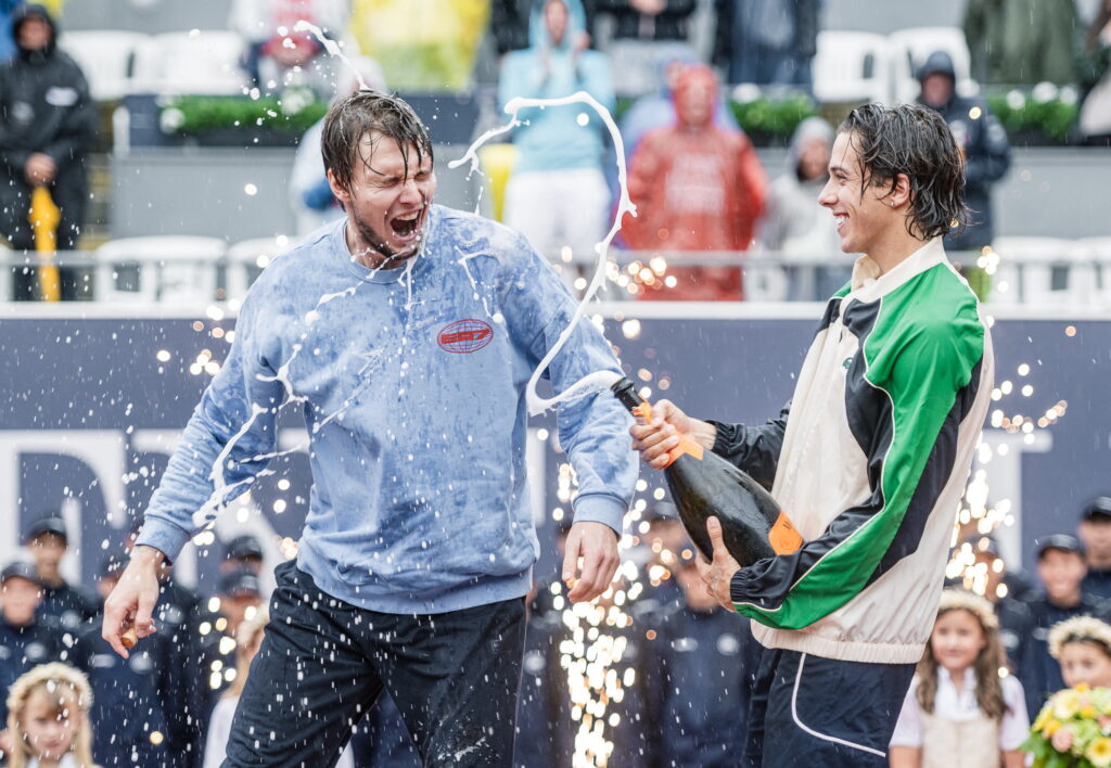 Alexander Bublik celebrates with Arthur Cazaux in Kitzbuhel.