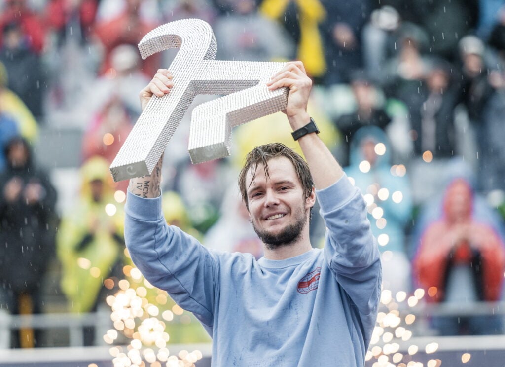 Alexander Bublik celebrates after winning his third title of 2025 in Kitzbuhel