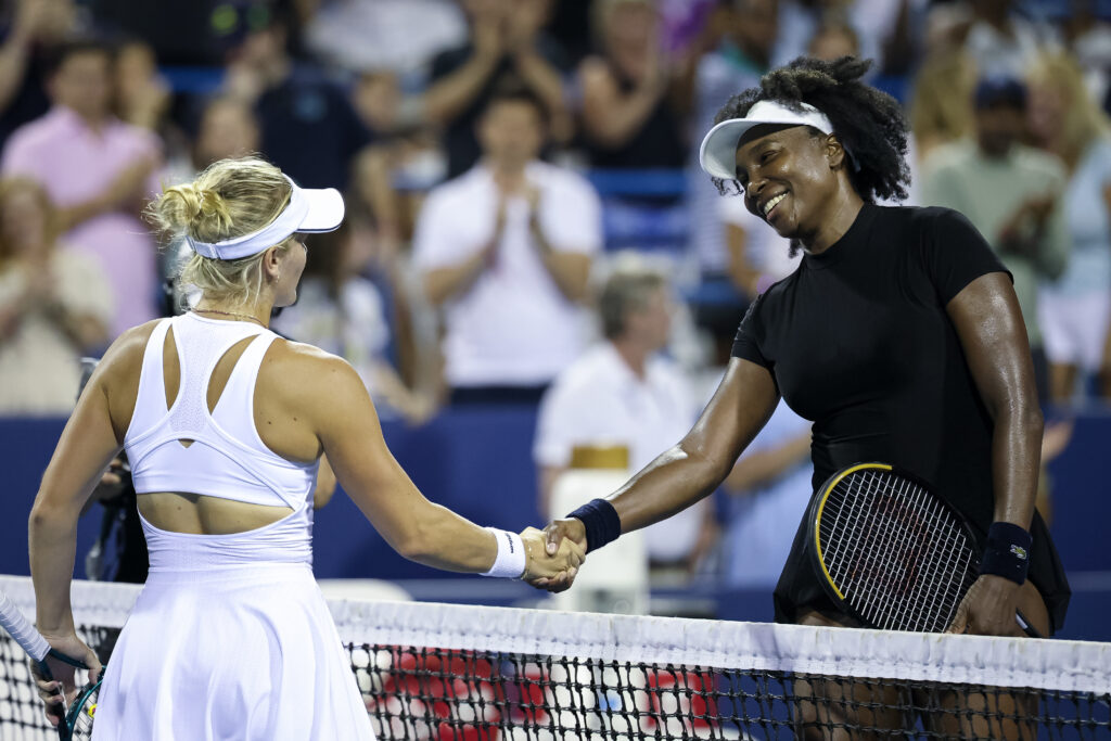Venus Williams and Peyton Stearns shake hands at the Mubadala Citi DC Open 2025 - Day 2