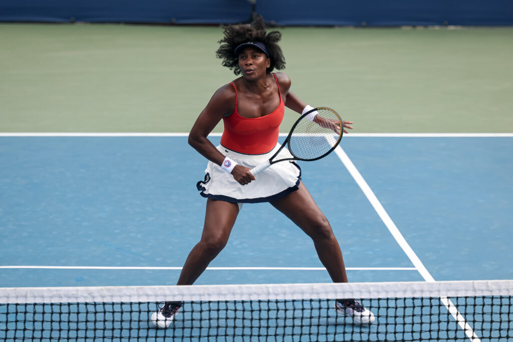 Venus Williams in action during a women's double match with Hailey Baptiste against Taylor Townsend and Shuai Zhang during a women's doubles match on day 3 of the Mubadala Citi DC Open 2025.