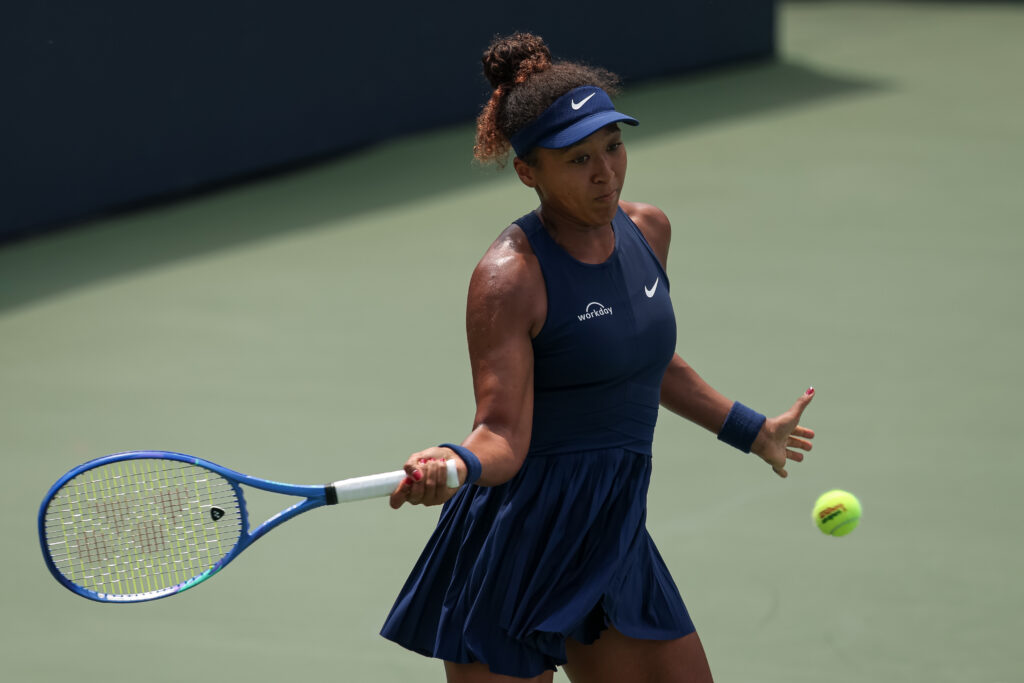 Naomi Osaka hits a forehand against Emma Raducanu at the Mubadala Citi DC Open 2025