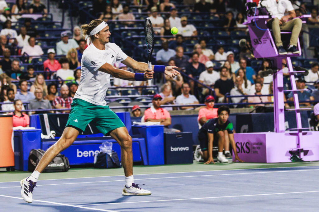 Alexander Zverev approaches the net to hit a volley at the 2025 National Bank Open