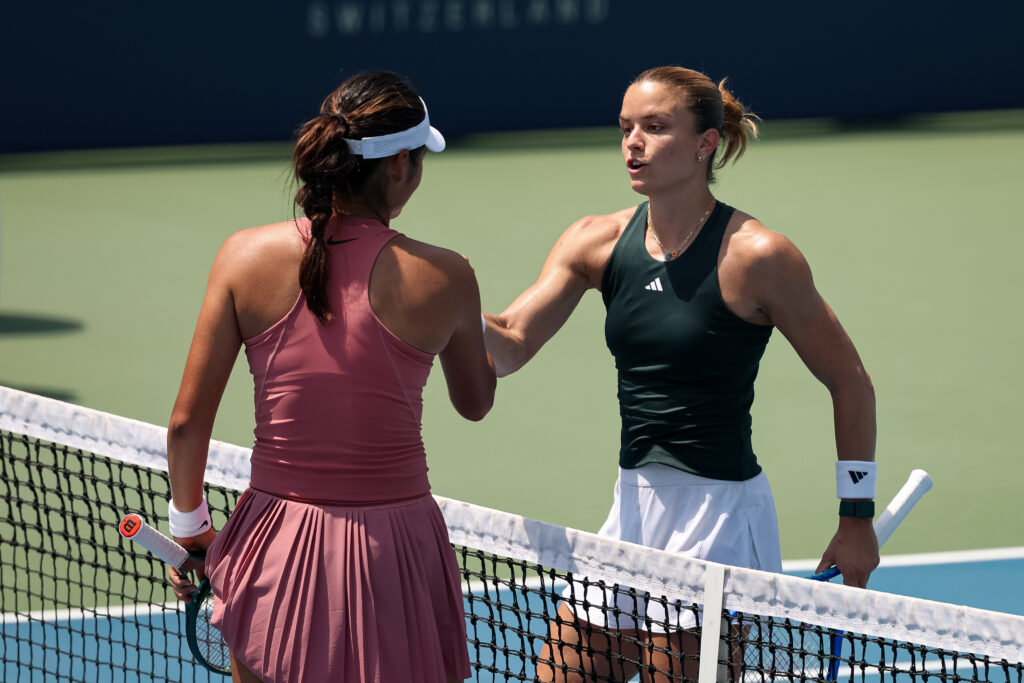 Emma Raducanu and Maria Sakkari shake hands after their match at the Washington Open.