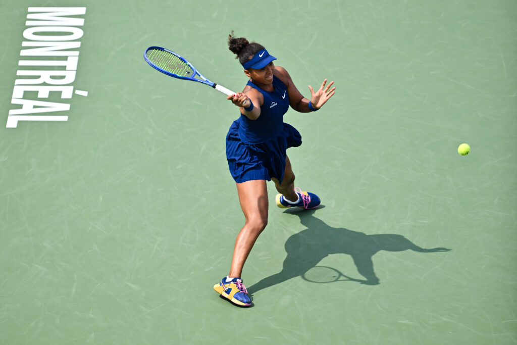 Naomi Osaka slides to retrieve a ball at the 2025 WTA 1000 National Bank Open presented by Rogers