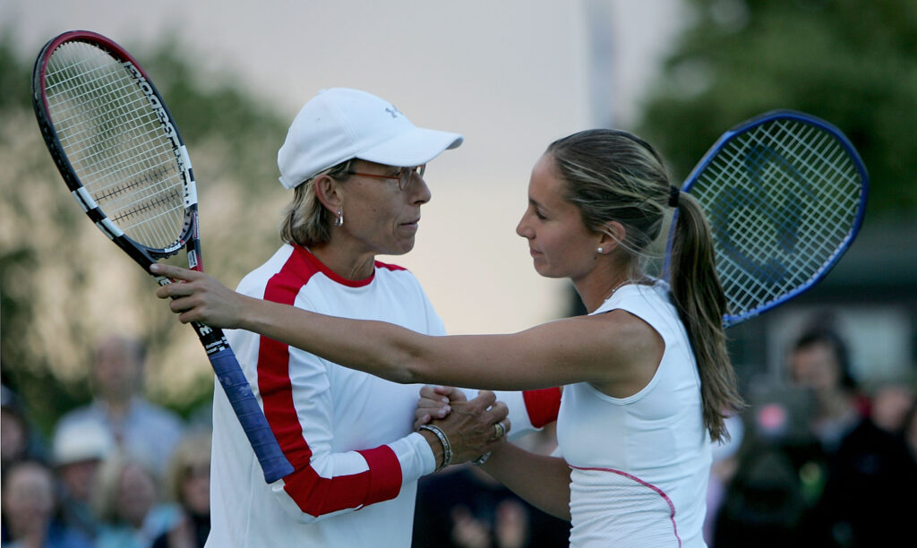 Martina Navratilova of USA congratualtes Gisela Dulko of Argentina after her second round match victory at the Wimbledon Lawn Tennis Championship.