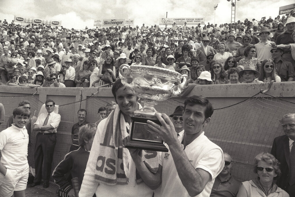 Ken Rosewall celebrates with the Australian Open title in 1972