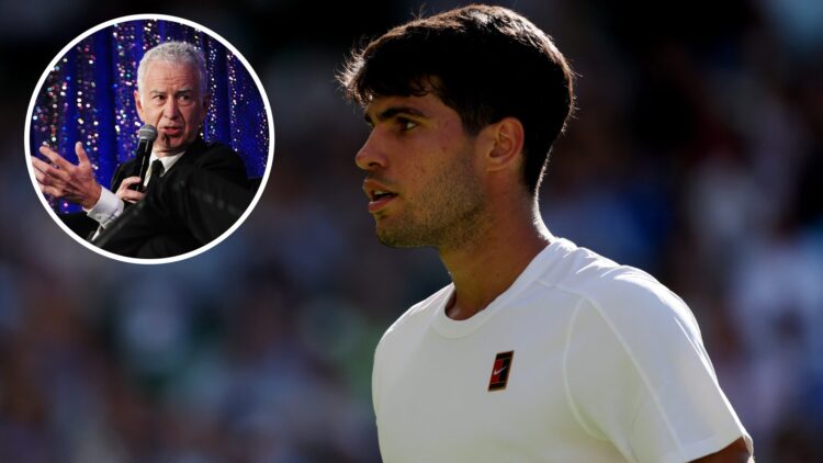 Carlos Alcaraz of Spain reacts against Fabio Fognini of Italy during the Gentlemen's Singles first round match on day one of The Championships Wimb...