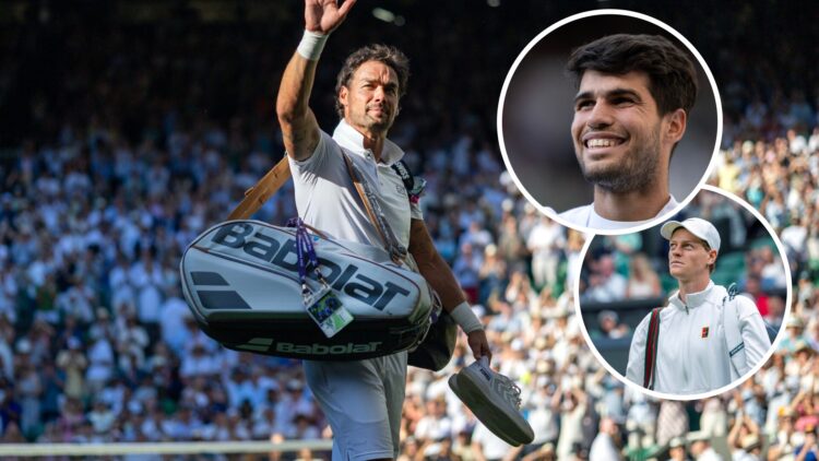 Fabio Fognini of Italy reacts to the applause from the spectators as he leaves the court after his marathon five-set loss against Carlos Alcaraz of...