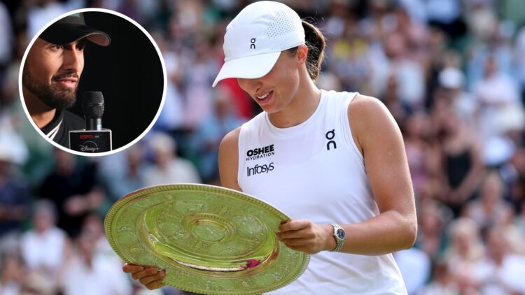 Iga Swiatek of Poland reacts with the Ladies’ Singles Trophy following her victory against Amanda Anisimova of United States during the Ladies' Sin...