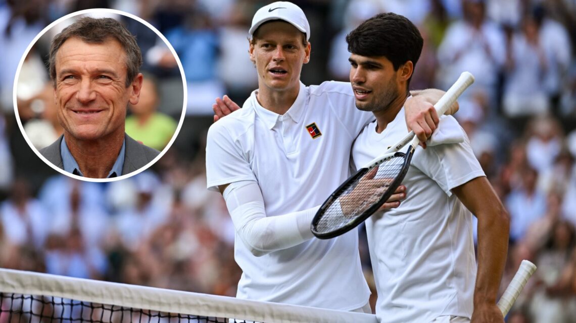 Jannik Sinner of Italy and Carlos Alcaraz of Spain after the Men's Singles Final on day fourteen of The Championships Wimbledon 2025 at All England...