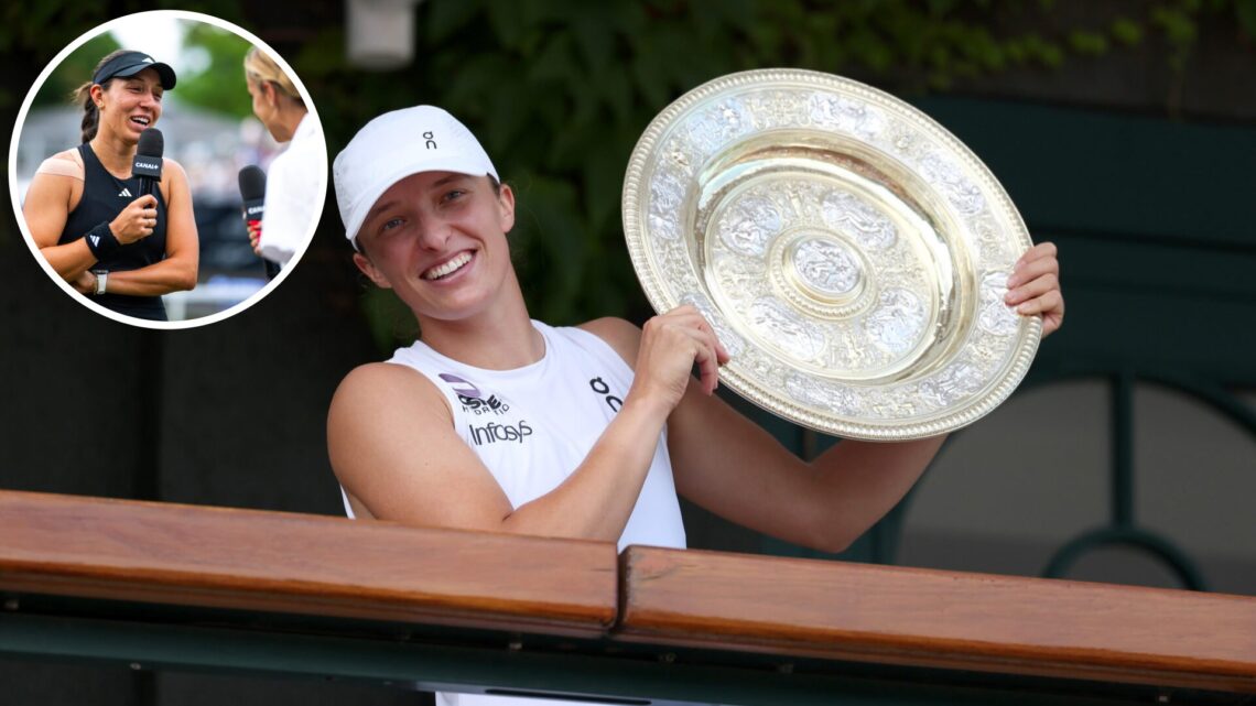 Iga Swiatek of Poland poses with the Ladies’ Singles Trophy on the Clubhouse Balcony, following victory against Amanda Anisimova of United States d...