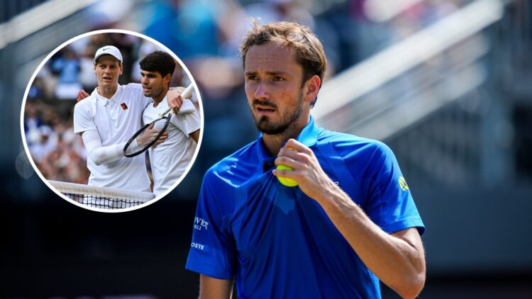 Jannik Sinner of Italy and Carlos Alcaraz of Spain (L) after the Men's Singles Final on day fourteen of The Championships Wimbledon 2025 at All Eng...