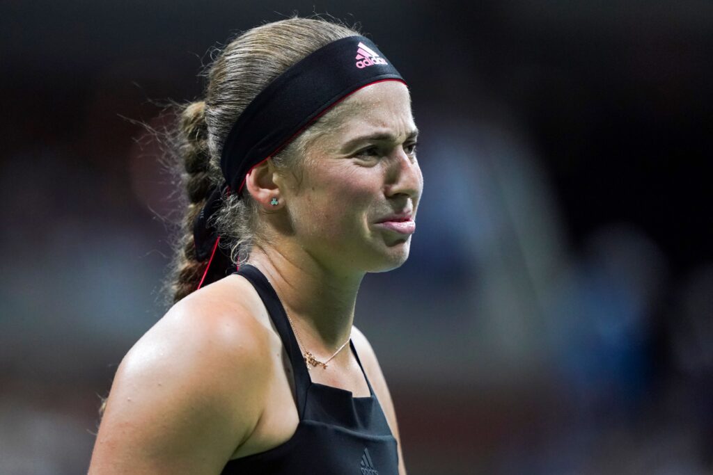 Jelena Ostapenko reacts during her match with Maria Sharapova at the 2018 US Open