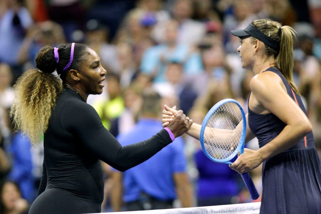 Serena Williams and Maria Sharapova shake hands at the net at the 2019 US Open