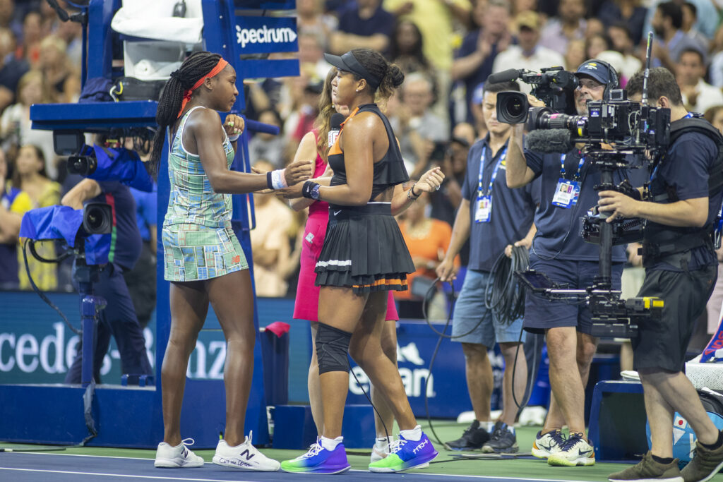 Naomi Osaka consoles Coco Gauff at the US Open in 2019.