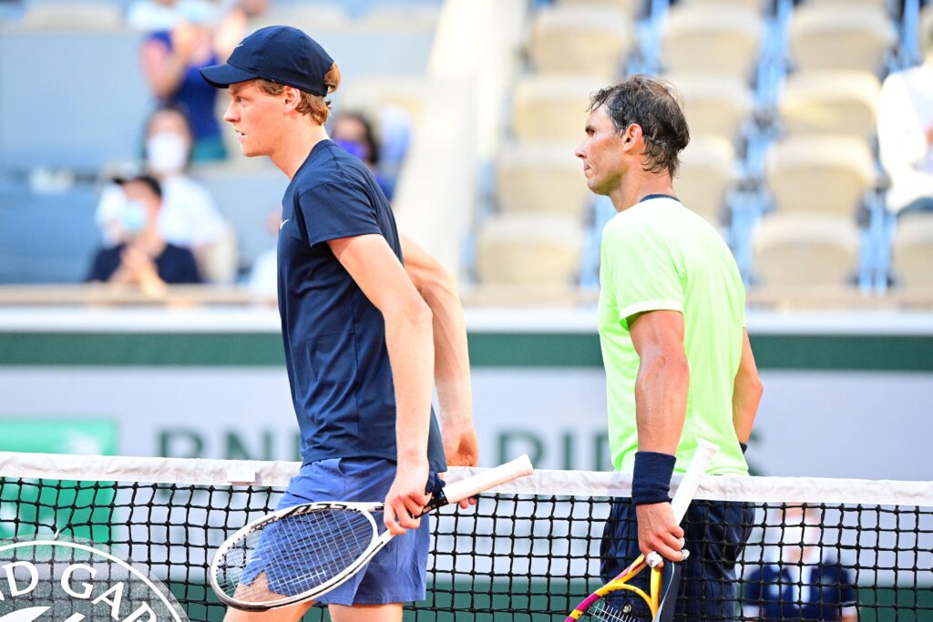Jannik Sinner and Rafael Nadal after a match at Roland Garros.