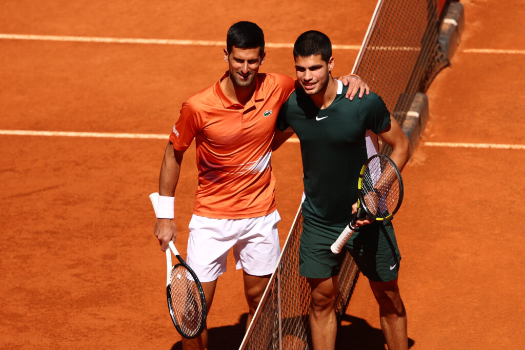 Novak Djokovic and Carlos Alcaraz at the net ahead of their Madrid clash in 2022.