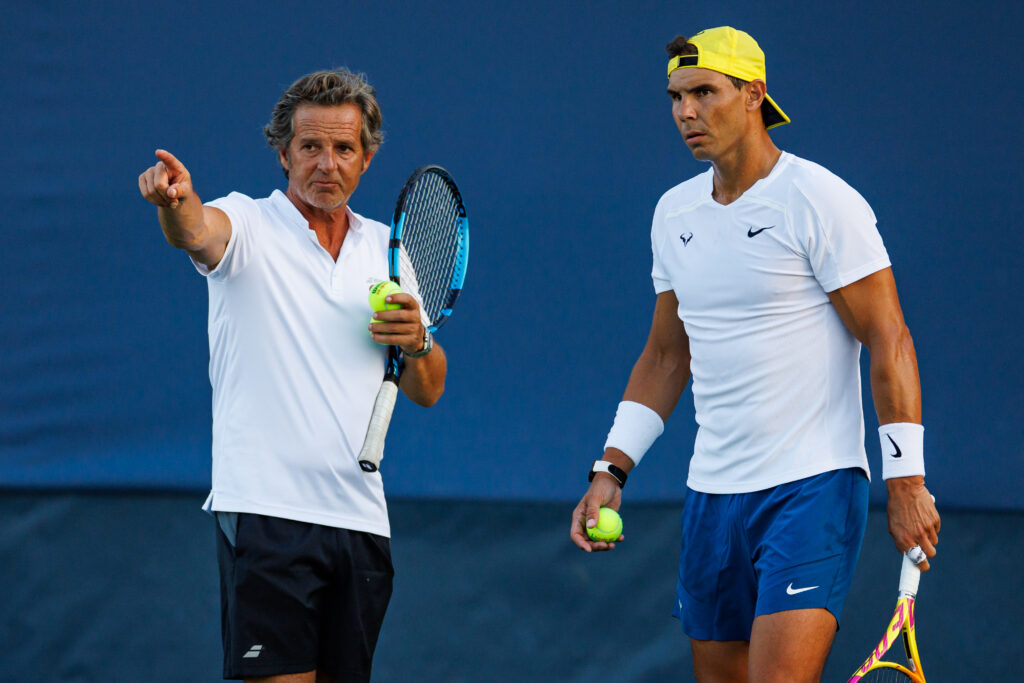 Rafael Nadal of Spain practices with his coach, Francisco Roig Genís in advance of his first match at the Lindner Family Tennis Center.