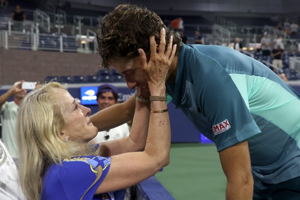 Tracy Austin greets her son Brandon Holt of the United States after his victory over Taylor Fritz of the United States during the Men's Singles First Round on Day One of the 2022 US Open at USTA Billie Jean King National Tennis Center.