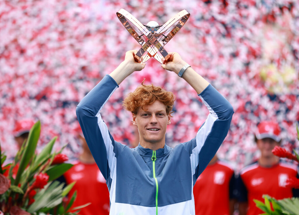 Jannik Sinner of Italy lifts the champions trophy after his win against Alex De Minaur of Australia in the Singles Final during Day Seven of the National Bank Open at Sobeys Stadium.