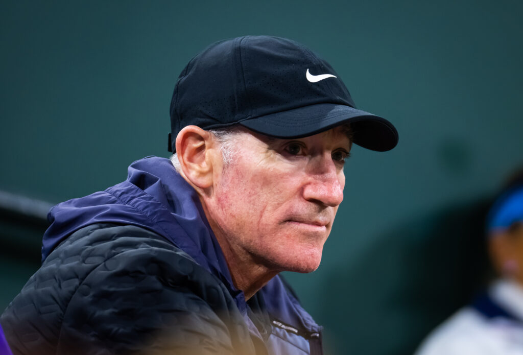 Brad Gilbert watches Coco Gauff of the United States play against Maria Sakkari of Greece in the women's singles semi-final on Day 13 of the BNP Paribas Open at Indian Wells Tennis Garden.