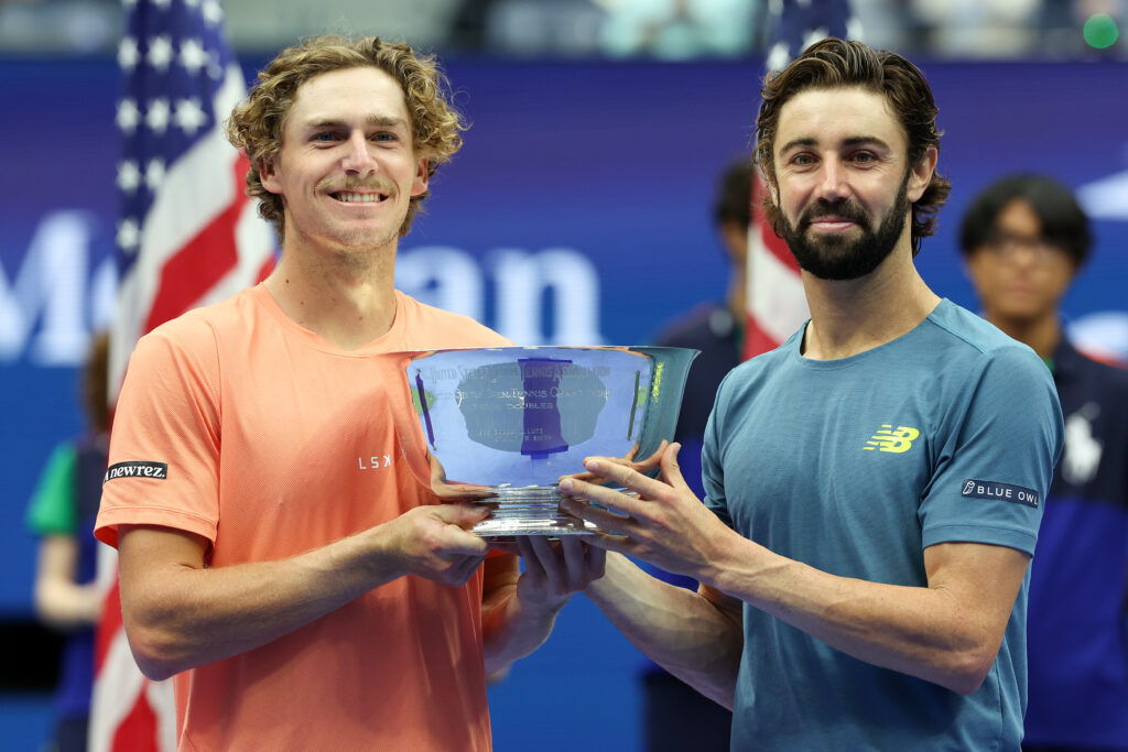 Max Purcell and Jordan Thompson pose with the titles after winning the 2024 US Open